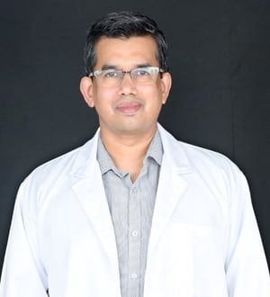 Dr K R Madhava